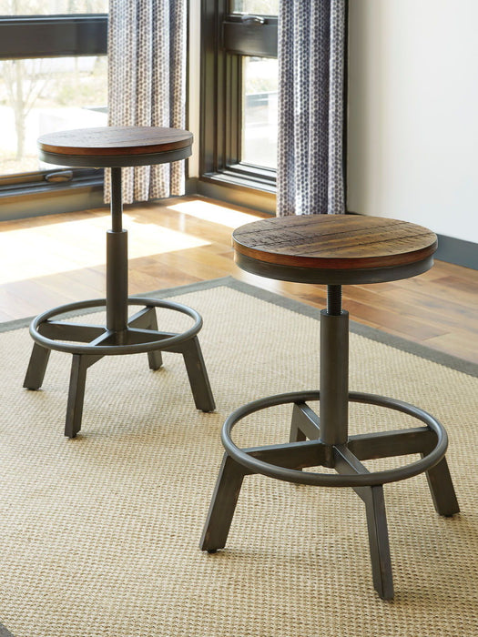 Torjin - Dark Brown - 3 Pc. - Long Counter Table, 2 Stools Sacramento Furniture Store Furniture store in Sacramento