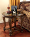 Norcastle - Dark Brown - Round End Table Sacramento Furniture Store Furniture store in Sacramento