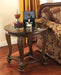 Norcastle - Dark Brown - Round End Table Sacramento Furniture Store Furniture store in Sacramento